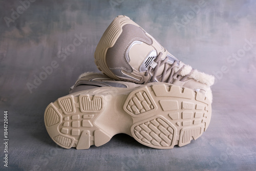 Winter sports shoes with warm lining inside. Women's winter sneakers