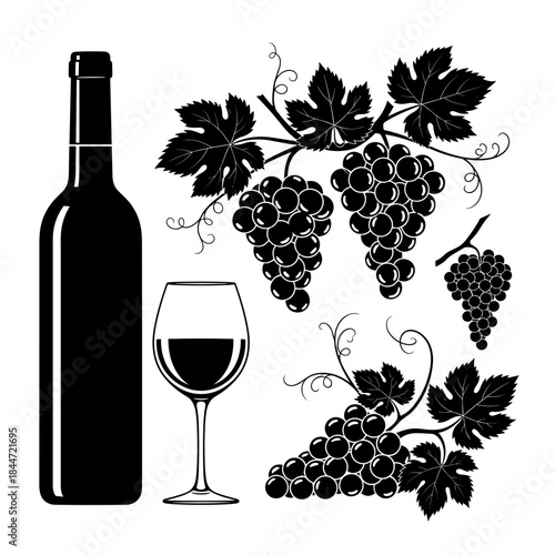 Wine bottle and glass stand beside lush grape clusters and sprawling vines in a bold monochrome still life silhouette with dramatic contrast.