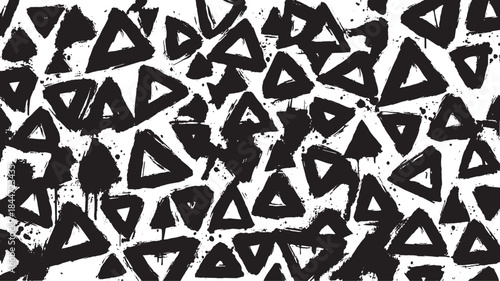Abstract pattern of black triangles on a white background. Artistic texture with paint splatters, designed as a monochrome vector illustration.