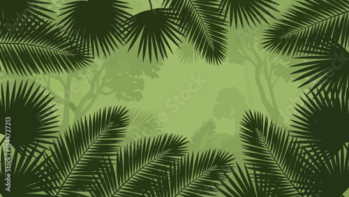 Tropical rainforest canopy with lush green palm leaves