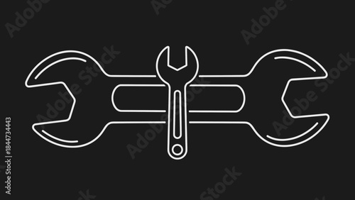 Two Wrenches Crossed on a Black Background.
