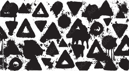 Black triangles with paint spatter texture. Abstract vector illustration featuring artistic design elements in a creative set.