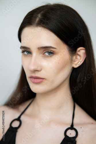 Wallpaper Mural Young female fashion model in clean studio environment showing digitals and modelbook snaps for agency profile portfolio in bikini, frontal and profile angles	
 Torontodigital.ca