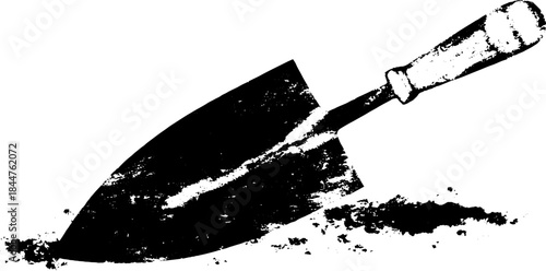 Black and white stencil illustration of garden trowel in soil for landscaping design