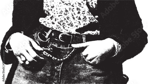 Closeup of a hand on a belt and denim jeans. This black and white vector illustration highlights casual fashion elements in a detailed set.