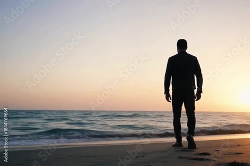 A man walking toward the sun. An atmospheric moment.