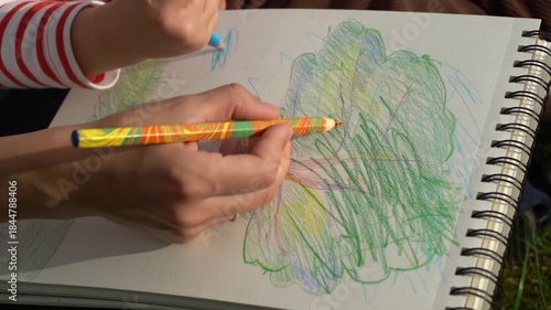 Mother and Toddler Drawing Together in a Summer Park. Parenting and Childhood Development Concept