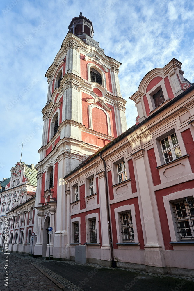 Obraz premium Historic Baroque buildings and the bell tower of a former monastery in Poznan