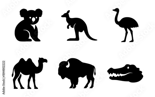 Black silhouette animals including a koala, kangaroo, and crocodile