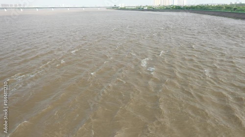 Aerial view of Tides on the Qiantang River in China. High quality 4k footage