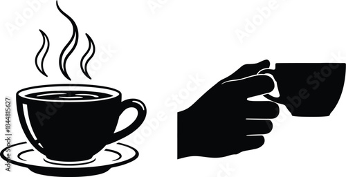 A steaming cup of coffee being held by a hand in black and white