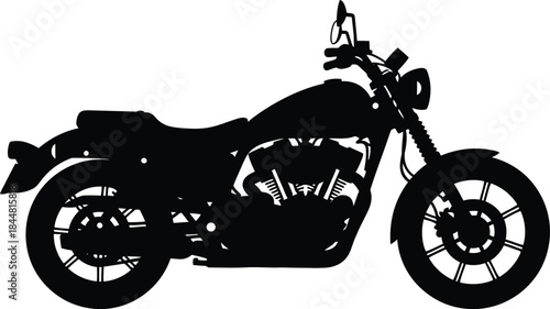 A striking silhouette of a classic motorcycle captured in a black and white style