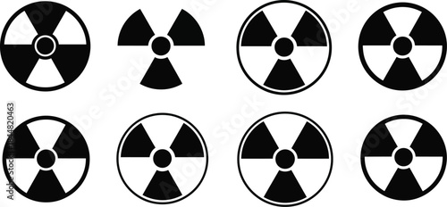 A collection of black and white radioactive hazard symbols arranged in a grid