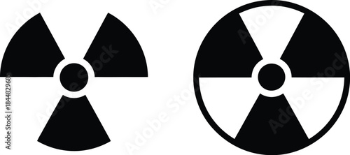 Two black radiation warning symbols different sizes on transparent background silhouette