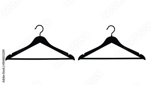Two black coat hangers isolated on a white background silhouette