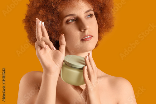 Young redhead woman with ja...