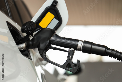 Refueling nozzle in car's f...