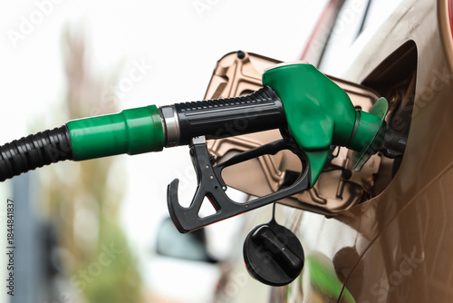 Refueling nozzle in car's f...