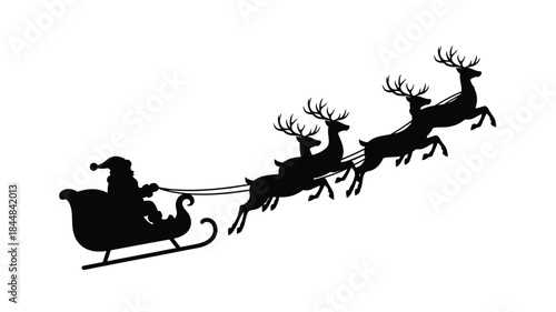 Santa claus and reindeer flying in a sleigh across the sky silhouette