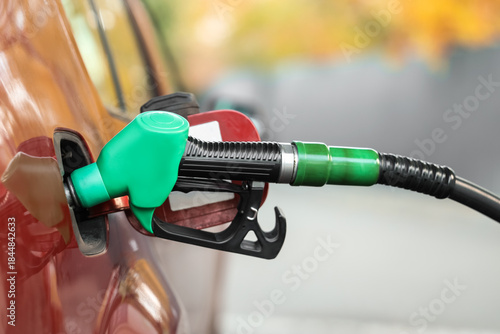Refueling nozzle in car's f...