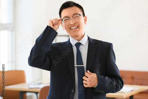 Portrait of smiling Chinese...