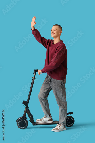 Teenage boy with electric s...