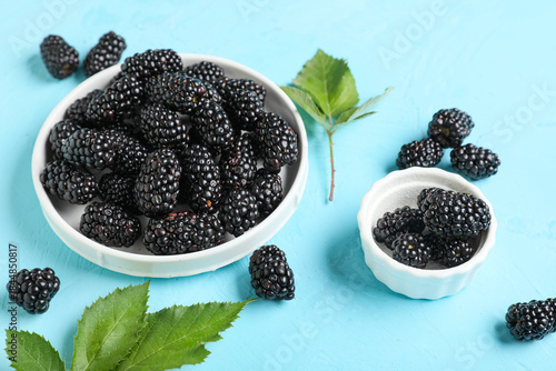 Bowls with ripe blackberry ...