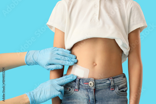 Doctor applying medical pat...