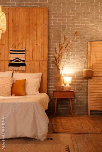 Bed, bedside table with glo...