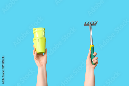 Female hands with pots and ...