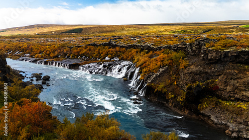 Tablou pe pânză Aerial view of stunning Hraunfossar waterfalls in Iceland during summer