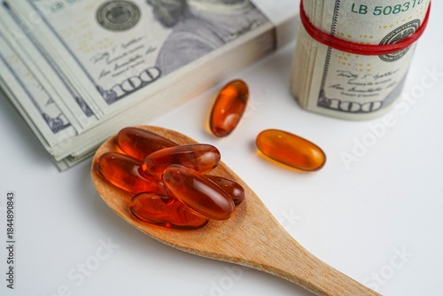 Medicine prescription drugs cost concept, Pills on money dollars, healthcare expenses