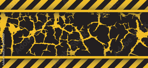 Caution tape framing a cracked black surface with gold fissures
