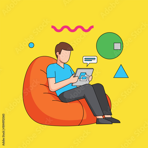 Man Relaxing with Tablet on Beanbag Chair.