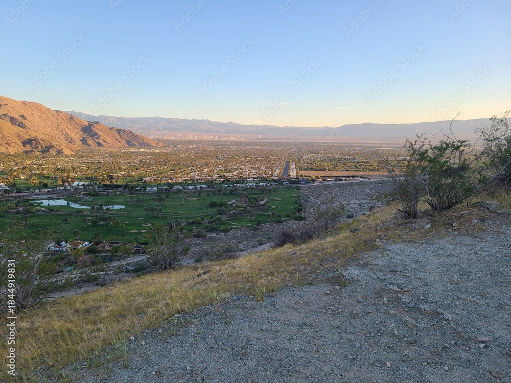 Naklejka premium Palm Springs and Peninsular range mountains at sunrise