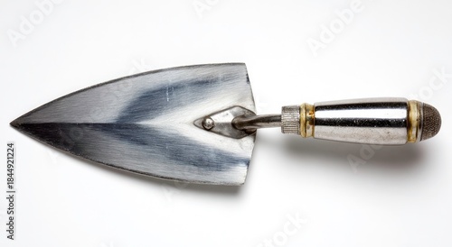 Close-up of a trowel tool, silver metal blade, wooden handle, on white background