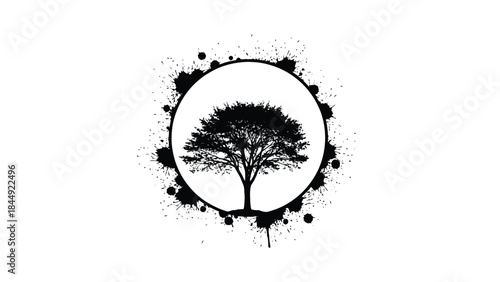 A solitary tree silhouette within a dark splattered oval frame