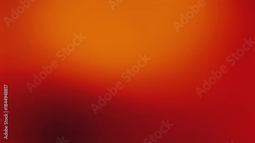 Abstract Red and Orange Gradient Background with Soft Focus Effect.