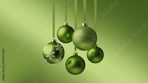 Green Christmas Ornaments Hanging on Strings against Gradient Background