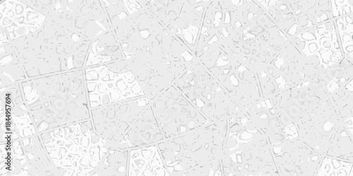 Abstract grayscale aerial view of fragmented land patterns and subtle lines