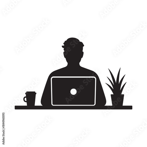 Silhouette of a person working on a laptop with a plant and coffee mug