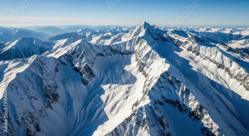 Wallpaper Mural Majestic snow-covered mountain range under a clear sky offers a breathtaking panoramic view for Torontodigital.ca