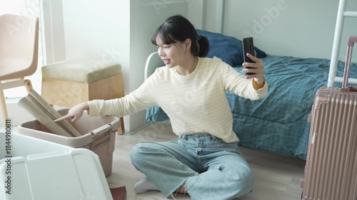 Asian girl Student talking on smart phone have conversation online virtual chat video call