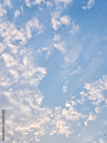 Tranquil blue sky filled with gentle textured cloud formations forming a peaceful and airy natural backdrop