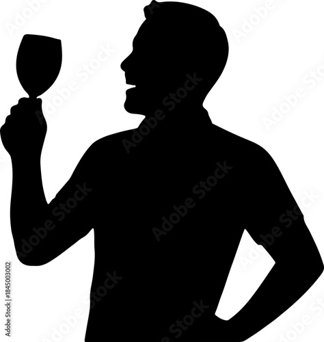 Silhouette of a man holding a wine glass and enjoying a drink