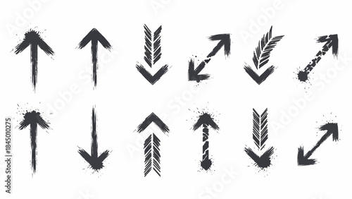 Set of grunge arrows with splashes pointing up, down, and diagonally for design elements