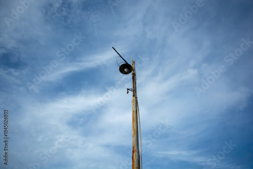 Light tower against dark blue sky background