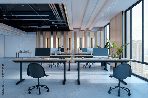 Modern open-plan office interior with minimalist furniture, natural lighting, and cityscape view through large windows. 3D Rendering