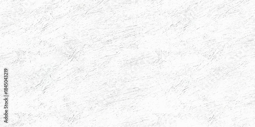 White wall, paper, and marble patterns on a gray, grunge, textured surface perfect for a blank winter backdrop or old stone design