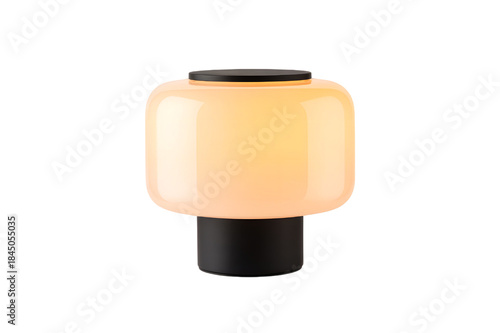 Modern minimalist table lamp featuring a warm amber glowing shade with a dark base